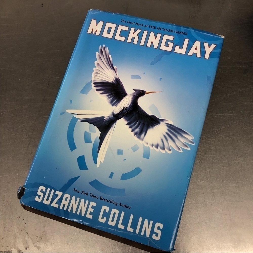 The Hunger Games Series: Mocking Jay by: Suzanne Collins, Hardback book